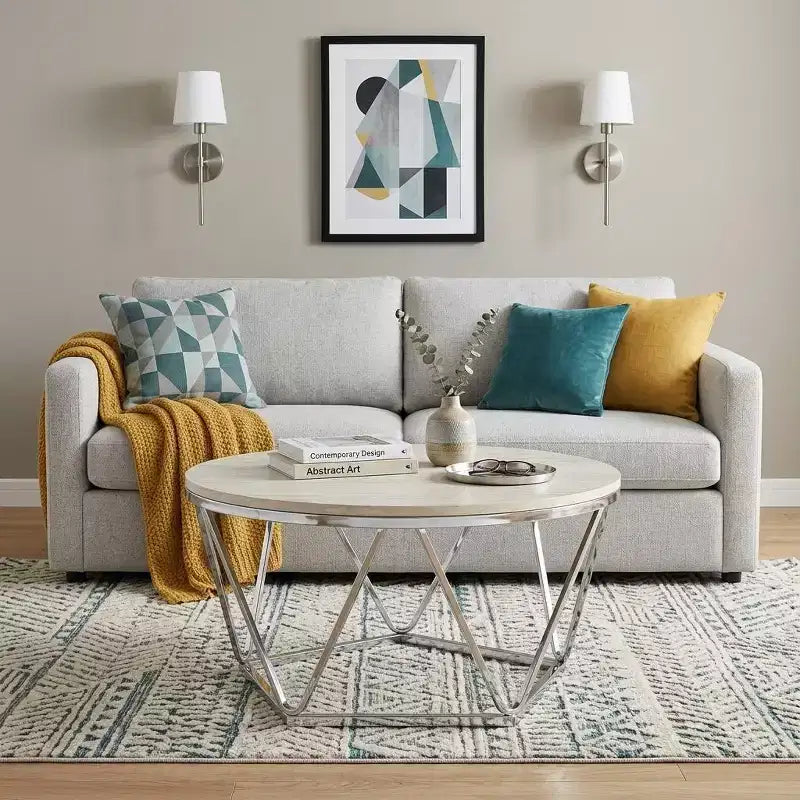 Table basse ronde argentée, structure en métal et plateau en pierre, 1 pièce